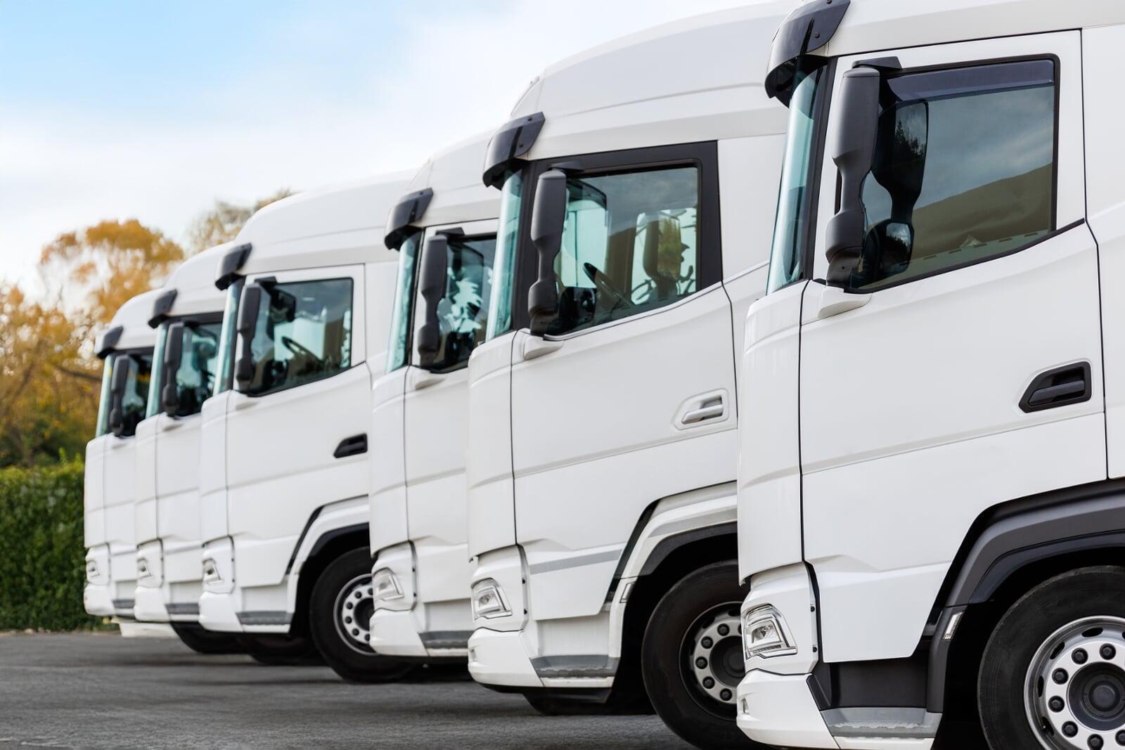 a fleet of trucks lined up